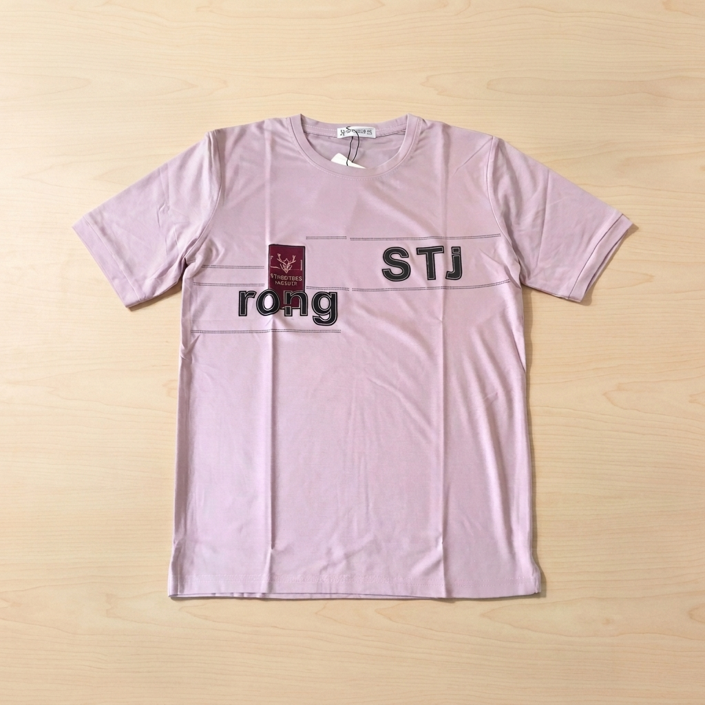 STJ Rong Kids T-Shirt Lavender – Young boy seated wearing tee